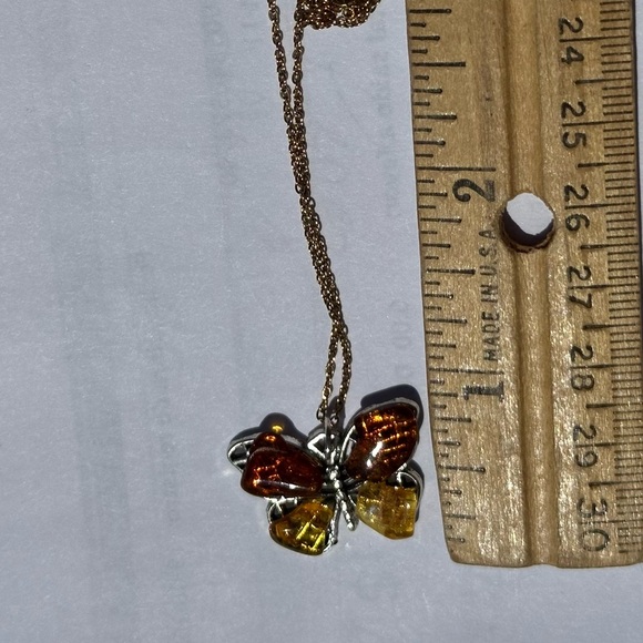 Amber Carved Butterfly Pendant with Gold tone chain - Picture 5 of 6